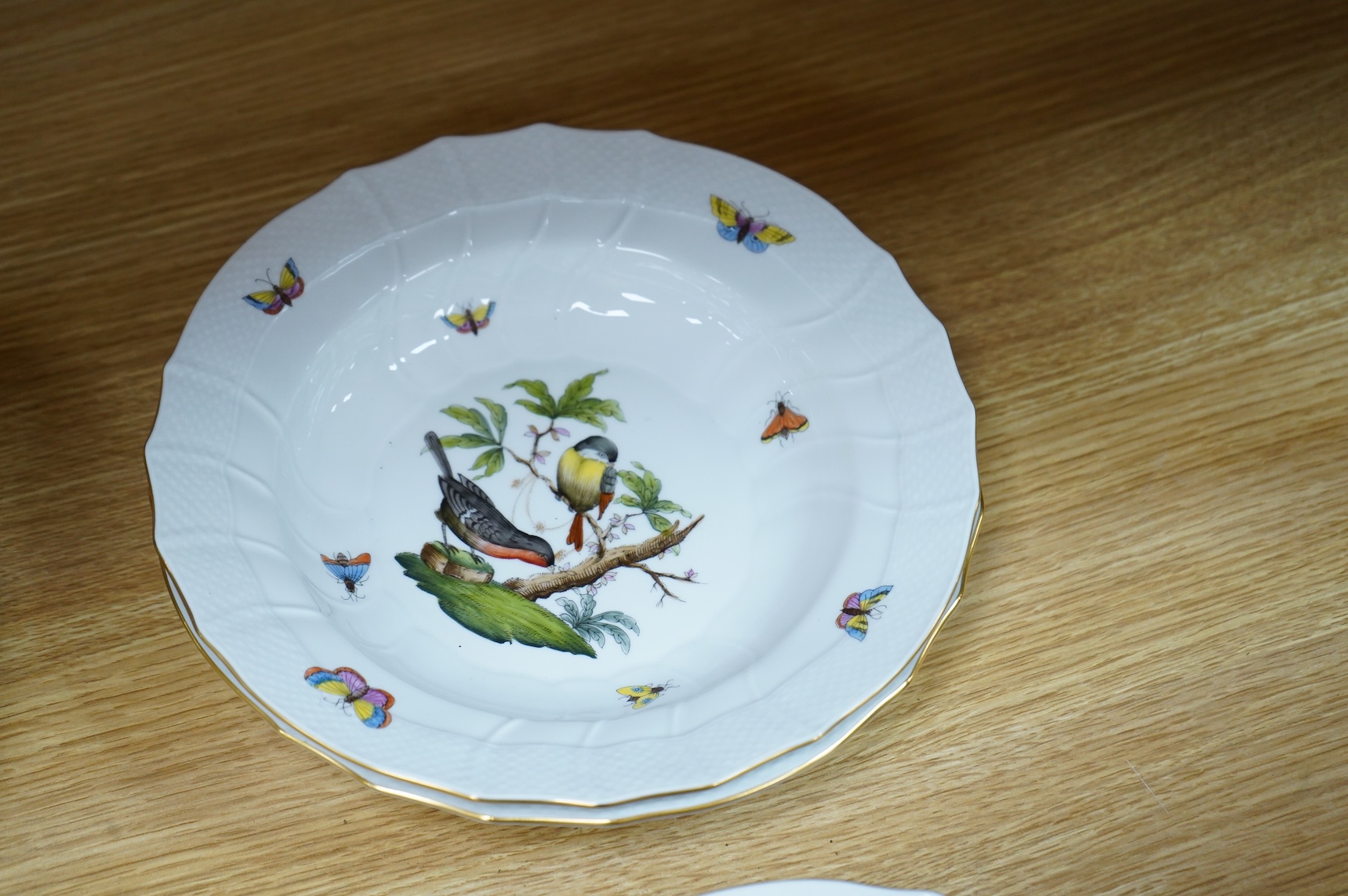 Eight Herend Rothschild 'birds' soup plates, 24cm in diameter